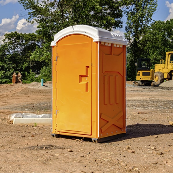 what is the cost difference between standard and deluxe portable restroom rentals in Funk NE